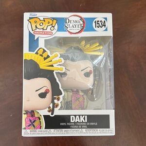 Funko Daki Pop! Vinyl - Pink, Yellow & Black